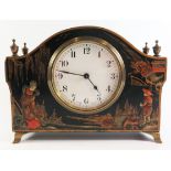 A Black Japanned Mantle Clock with Buren movement, winds and runs