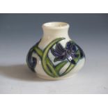 A Modern Moorcroft Periwinkle Pattern Squat Vase, base marked 2014, 6cm, boxed