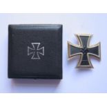 A WWII German 3rd Reich Iron Cross 1st Class (vaulted), pin stamped 65, boxed