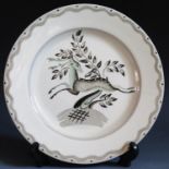 A Clarice Cliff 8" Art In Industry Plate decorated with a leaping deer, designed by Billie Waters,