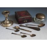 A Loaded Silver Candlestick, silver top dressing table pot, teaspoons and silver mounted box, 53g
