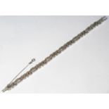 An 18ct White Gold and Diamond Bracelet, 19cm, 22g