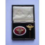 A German Third Reich NSFK (Nationalist Socialist Flying Corps) Red Enamel award with pin, award back