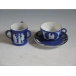 A Wedgwood Blue Jasper Miniature Teacup with saucer (68mm) and loving cup (rim chip)