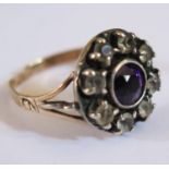A Georgian Paste Dress Ring in an unmarked gold =and silver setting, size I.5, 2.9g, head 14mm.