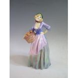 A Royal Doulton Figurine The Orange Seller HN1325 by Leslie Harradine. Slightn hairline to base