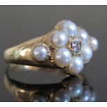 A Georgian Pearl and Diamond Ring in a precious yellow metal setting (unmarked), size M.5, 6.1g,