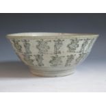 A Chinese Stoneware Bowl, 23cm wide x 10cm high, chip to inner rim