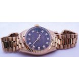 A Ladies Rolex Oyster 18ct Gold Datejust Wristwatch with maroon diamond set dial, 2030 movement