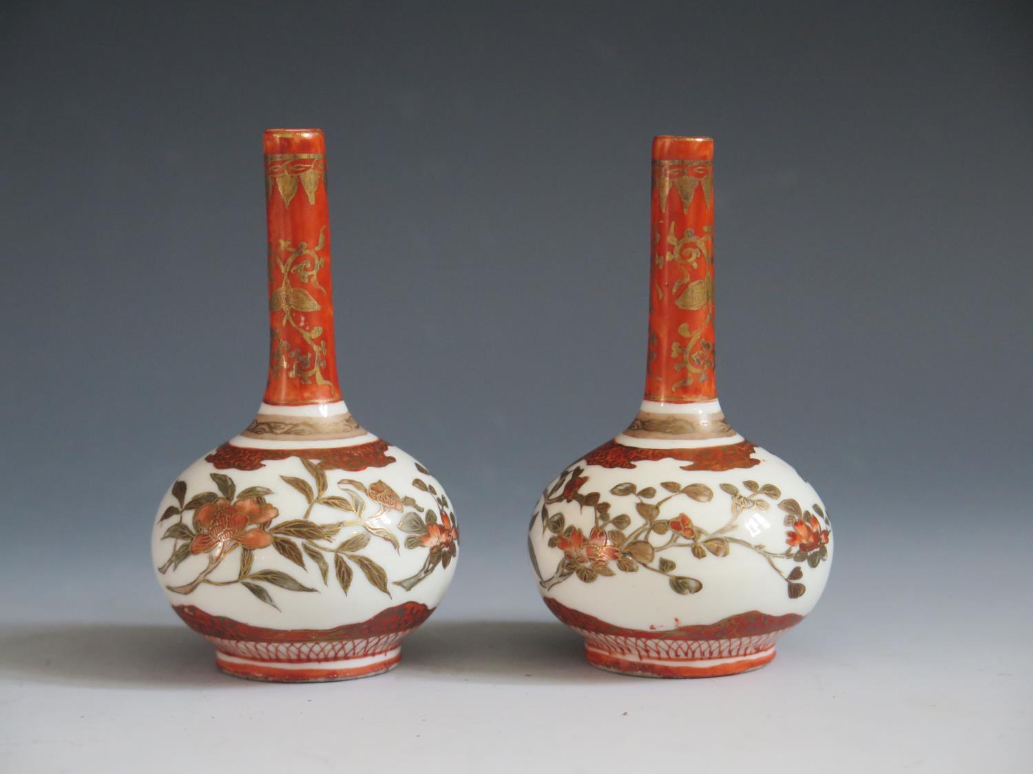 A Pair of Japanese Meiji Period Porcelain Pinch Neck Vases decorated birds and foliage, signature to