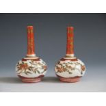 A Pair of Japanese Meiji Period Porcelain Pinch Neck Vases decorated birds and foliage, signature to