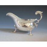 A Large George V Silver Sauce Boat with scrolling handle and scalloped feet, Chester 1926, S.