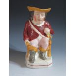 A Nineteenth Century Cavalier Character Jug, rim restored and crazing