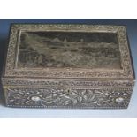 Am Indian Silver Presentation Box decorated with a chased intricate landscape detailing bathing,
