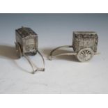 A Pair of Miniature Silver Caravan Salt and Peppers, bases stamped STERLING 950, 7cm long x 3.9cm