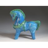 A Bitossi Style Rimini Blue Majolica Horse, base of one foot marked ITALY, 28cm tall