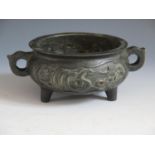 A Chinese Bronze Censer with lug handles and tripod base, four character mark, 17.5(w)x7(h)cm