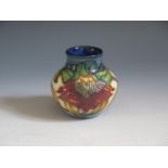 A Modern Moorcroft Anna Lily Patern Vase, base marked 98, boxed