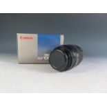 A Canon MACRO EF100mm f/2.8 Lense. Appears in excellent condition