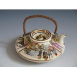 A Japanese Satsuma Squat Teapot decorated with figures and wisteria, 10cm wide x 4cm high, signed to