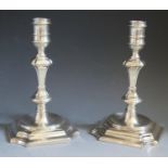 A Pair of Elizabeth II Cast Silver Candlesticks in the early 18th century style, Sheffield 1977,