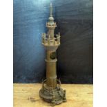 A Trench Art 'Working Model' Light House with cog driven mechanism, 75cm high. Model with parts