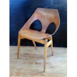 A 1950s Jason Chair designed by Carl Jacobs & Frank Guille for Kandya. Some staining and bleaching