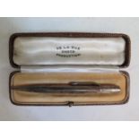 A De La Rue Onoto Silver Propelling Pencil in case