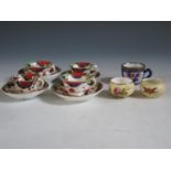 A Set of Four Imari Palette Miniature Teacups with saucers (6cm diam.), two miniature Royal