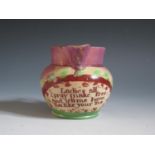 A Sunderland Lustre Milk Jug with polychrome decoration and poetic text 'Ladies all I pray make