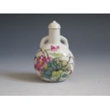 A Chinese Porcelain Snuff Bottle with floral enamel decoration, 7.5cm