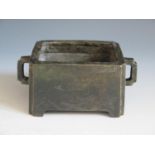 A Chinese Bronze Censer with lug handles, four character mark to base, 15(w)x9(d)x6.7(h)cm