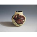 A Modern Moorcroft Chocolate Cosmos Pattern Squat Vase, base marked 2013, 6cm, boxed