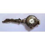 A Ladies Silver Trench Watch, running but glass, dial and hands damaged