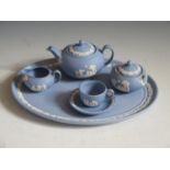 A Wedgewood Blue Jasper Miniature Tray Tea Set, tray 17cm