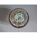 A Venetian Millefiori Footed Glass Paperweight, 9cm high