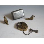 A Bryant & May Wax Vestas Tin decorated with a stage coach, Victorian brass padlock, cigar cutter in