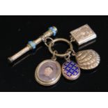 A Small Victorian Gold Plated and Turquoise Inlaid Fob Pencil (42mm) and and four memorial charms