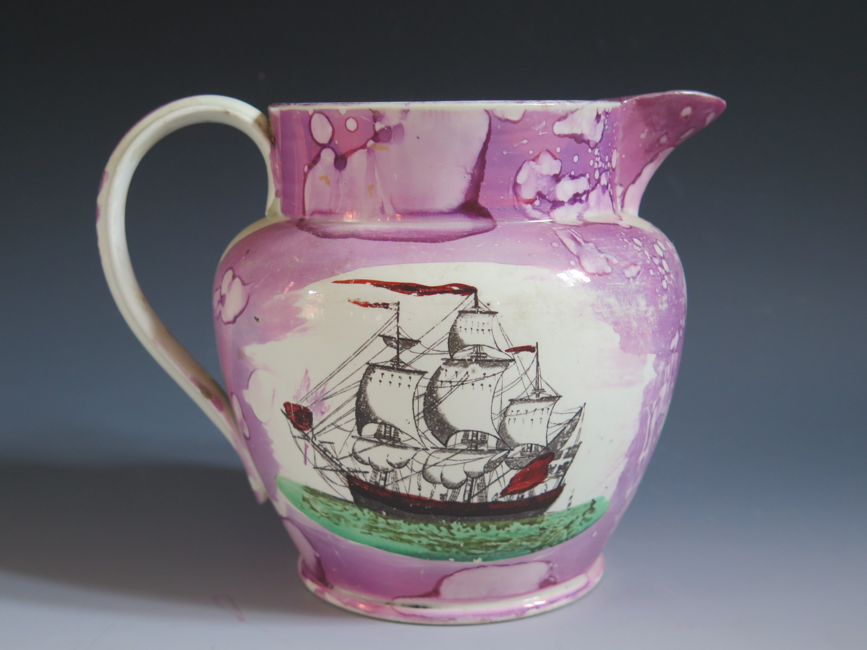 A Sunderland Lustre Jug with polychrome decoration of a three masted ship and poetic text 'The