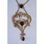 A 9ct Gold, Garnet and Pearl Necklace, 55mm drop from top garnet, 5.3g