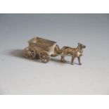 A Sterling Silver Dolls House Miniature Dog Cart, London import 1914, B.H.M., 6cm long