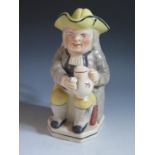 A Nineteenth Century Toby Jug with cover, 25.5cm, crazing