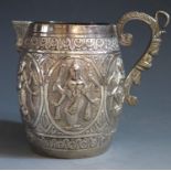 An indian White Metal Jug embossed with decoration of Hindu deities, 10cm high, 169g