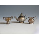 A Dutch Silver Dolls House Miniature Three Part Tea Set, the teapot with swan finial and mask spout,