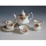 A Royal Albert Old Country Roses Nursery Tea Set, pot 8.5cm