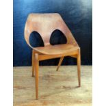 A 1950s Jason Chair designed by Carl Jacobs & Frank Guille for Kandya. Some staining and bleaching