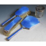 A Three Part Birmingham Silver and Blue Guilloché Enamel Hand Mirror, Brush and Comb Set and