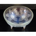 A Rene Lalique 'Lys' Coupe with moulded with opalescent lily blossoms and raised on four stems,
