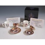 A Collection of Royal Crown Derby Miniatures including two teacups and Diamond Jubilee and William