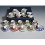 A Colelction of Coalport Miniature Teacups with saucers etc.